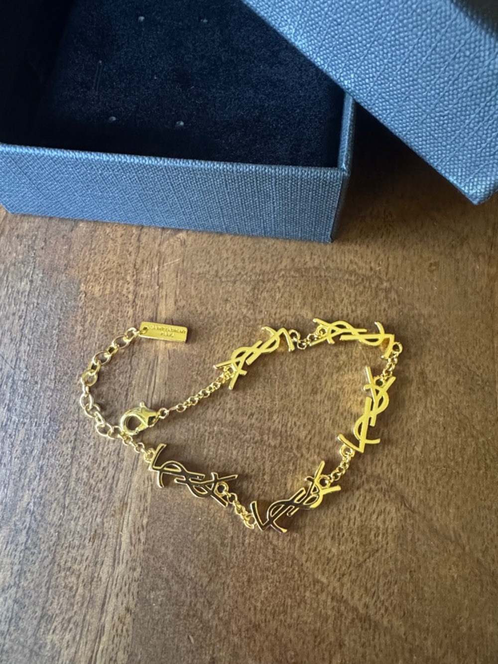 Saint Laurent Gold-Tone YSL Link Bracelet - Picture 8 of 9